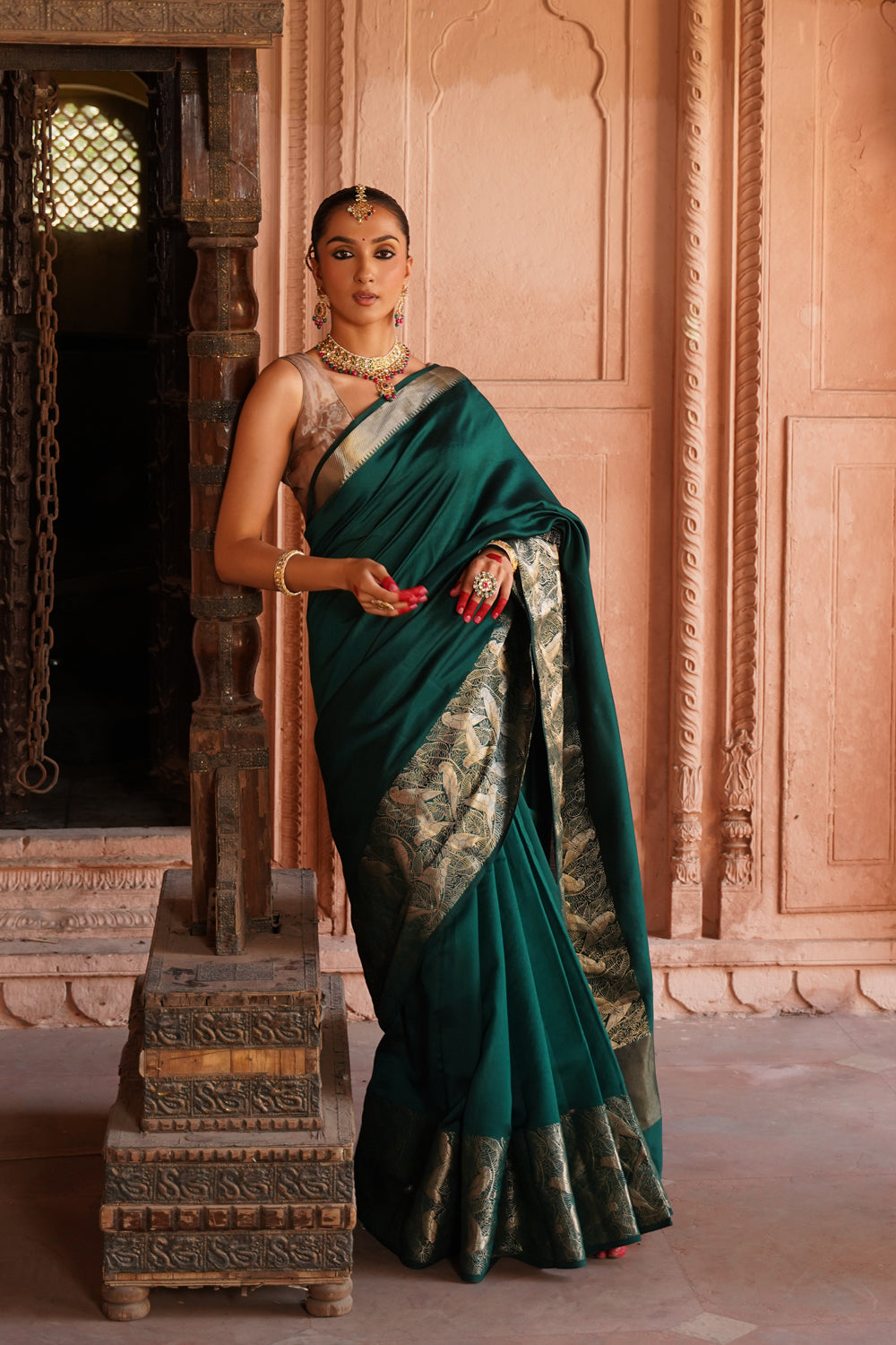 Handwoven Katan Silk Saree in Bottle Green with Silver Bird Motifs