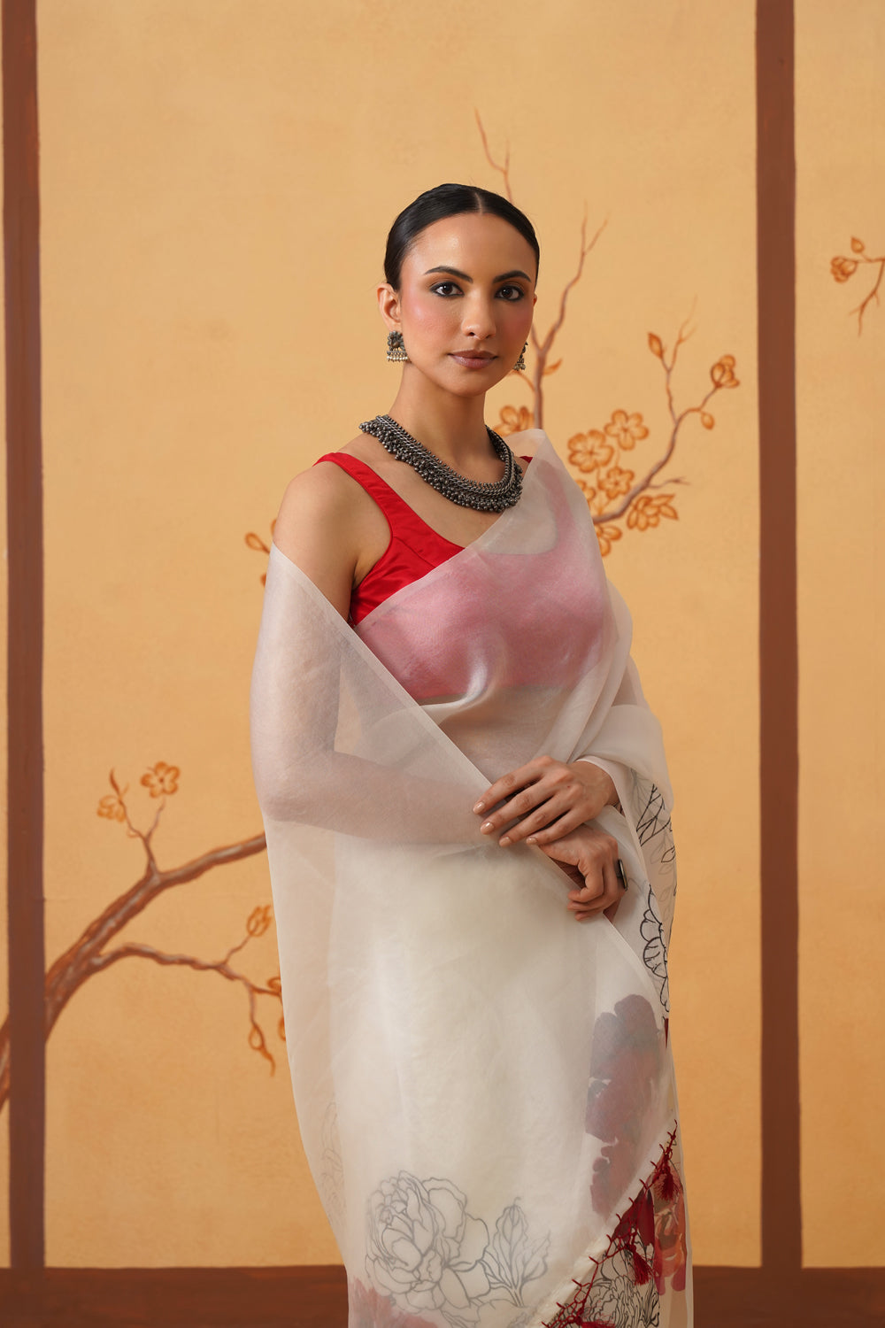 Crimson Bloom: Kora Organza Saree with Floral Art