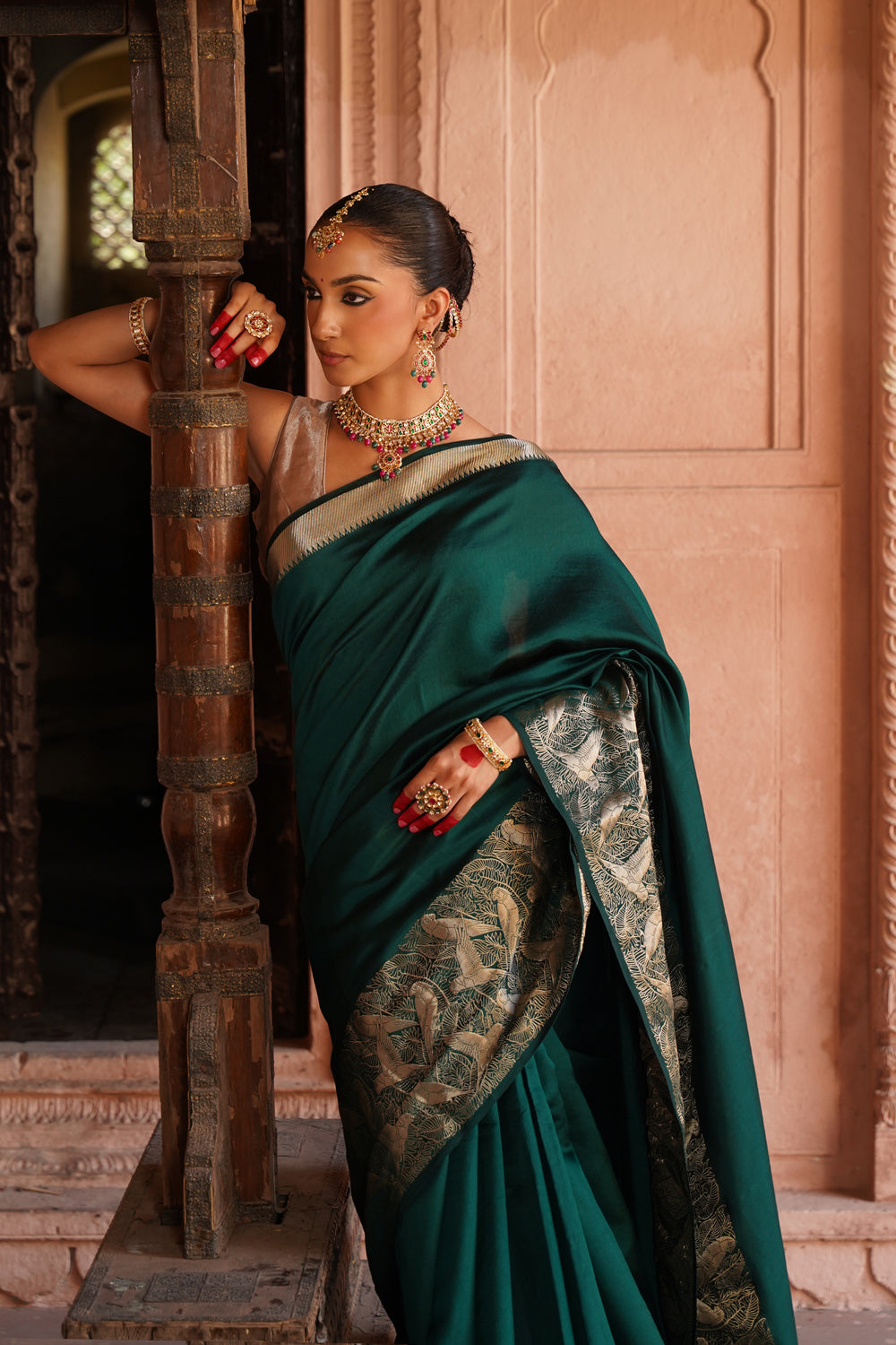 Handwoven Katan Silk Saree in Bottle Green with Silver Bird Motifs
