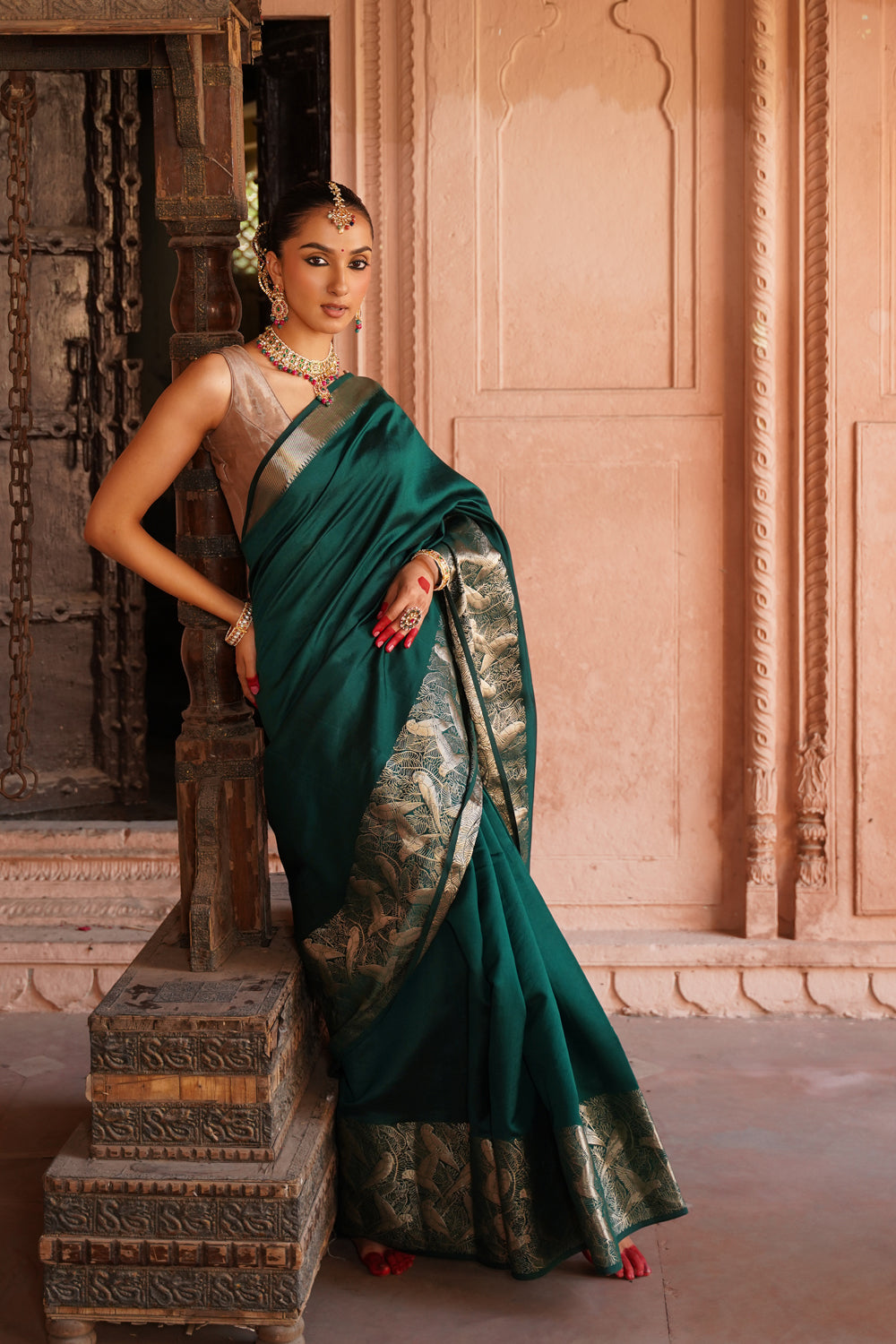 Handwoven Katan Silk Saree in Bottle Green with Silver Bird Motifs