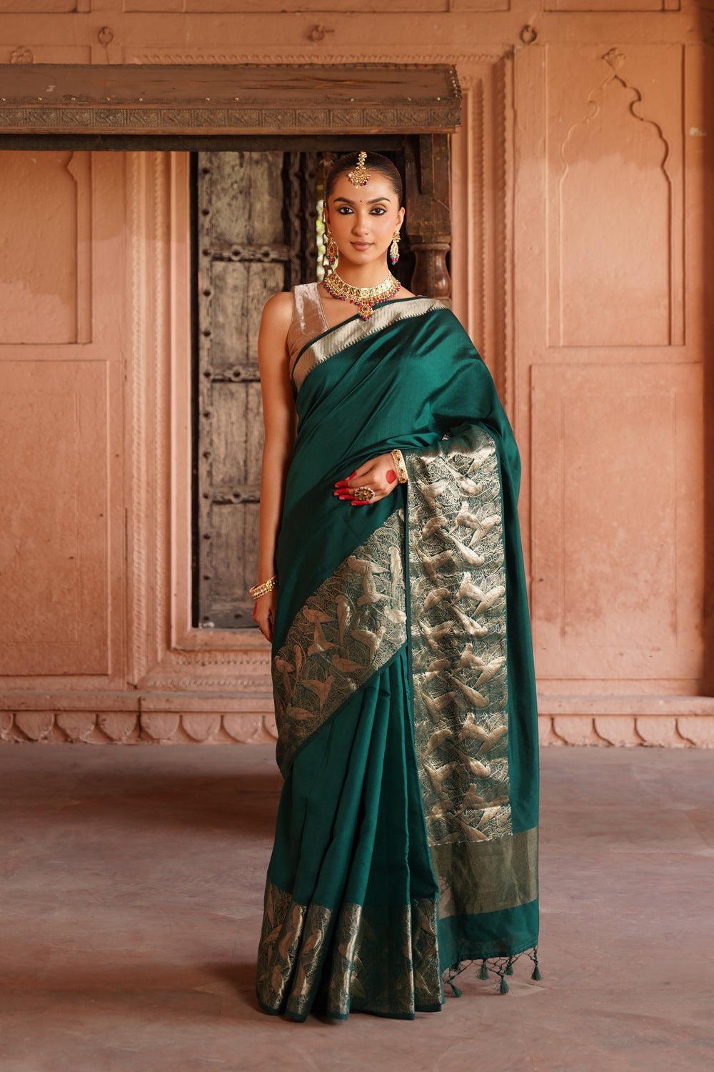 Handwoven Katan Silk Saree in Bottle Green with Silver Bird Motifs